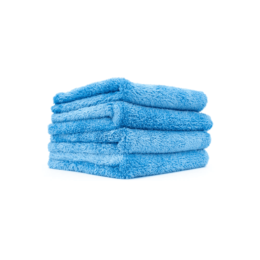 the-rag-company-eagle-edgeless-500-bestes-mikrofasertuch-40x40cm-blau-4stk Stapel blauer Mikrofasertücher.
